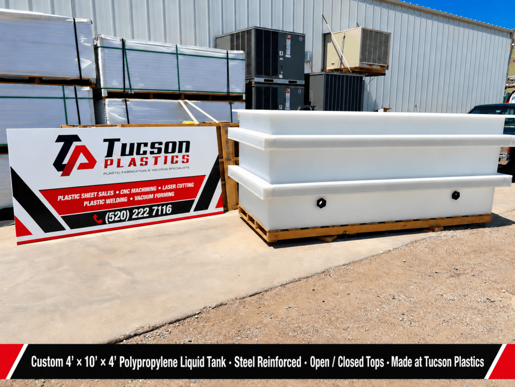 Custom 4 by 10 by 4 foot polypropylene liquid tank, steel reinforced, with open or closed tops, made at Tucson Plastics